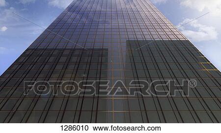 Stock Image - Windows of an office building, low angle view, close-up. Fotosearch