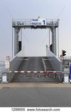 A bridge used to load cars onto a ferry, with German language sign View Large Photo Image Stock Photography - A bridge used to load cars onto a ferry, with German language sign . Fotosearch