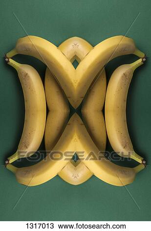 A digital composite of mirrored images of an arrangement of bananas View Large Photo Image Stock Image - A digital composite of mirrored images of an arrangement of bananas. Fotosearch