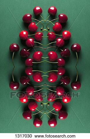 A digital composite of mirrored images of an arrangement of cherries View Large Photo Image Stock Image - A digital composite of mirrored images of an arrangement of cherries. Fotosearch
