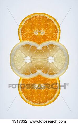 A digital composite of mirrored images of slices of orange and lemon View Large Photo Image Stock Image - A digital composite of mirrored images of slices of orange and lemon. Fotosearch