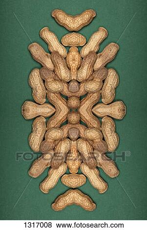 A digital composite of mirrored images of an arrangement of peanuts View Large Photo Image Stock Photo - A digital composite of mirrored images of an arrangement of peanuts. Fotosearch