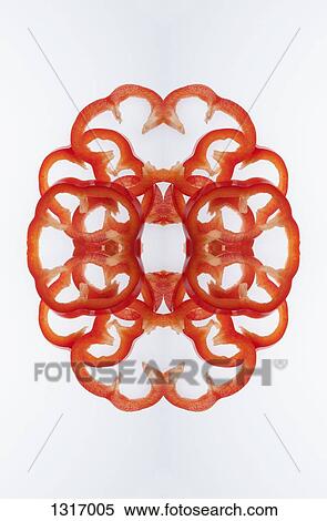 A digital composite of mirrored images of slices of red bell pepper View Large Photo Image Stock Photography - A digital composite of mirrored images of slices of red bell pepper. Fotosearch