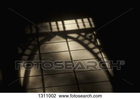 Arch shadow on tiled floor View Large Photo Image Stock Image - Arch shadow on tiled floor. Fotosearch
