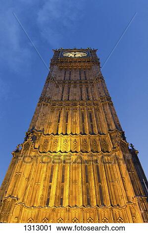 Stock Image - Big Ben at dusk, low angle view, London, England. Fotosearch