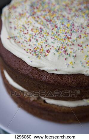 Cake with sprinkles, close-up View Large Photo Image Stock Image - Cake with sprinkles, close-up. Fotosearch