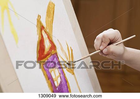 Child's hand painting, close-up View Large Photo Image Stock Photo - Child's hand painting, close-up. Fotosearch