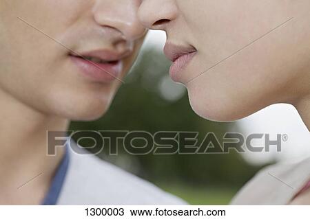 Stock Image - Close-up of couple. Fotosearch