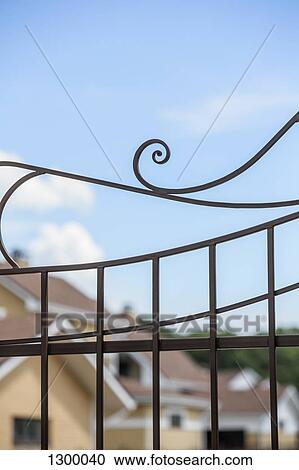 Stock Image - Close-up of metal gate. Fotosearch