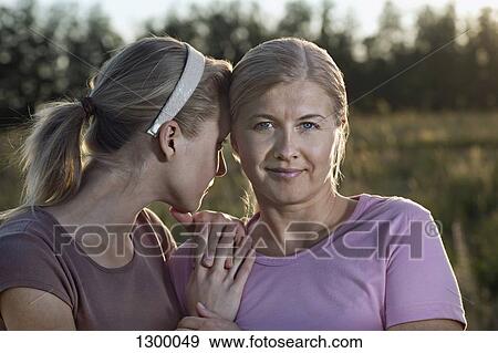 Stock Photo - Close-up of mother and daughter. Fotosearch
