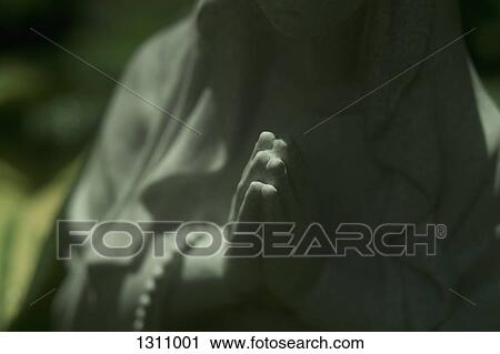 Stock Image - Close-up of statue. Fotosearch