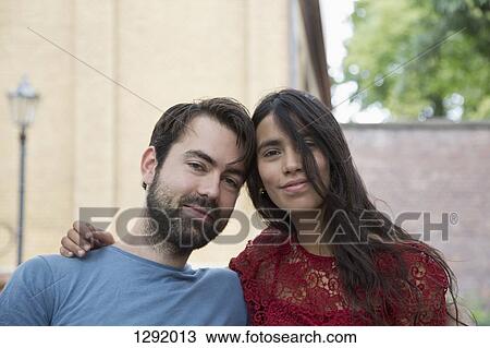 Close-up of young couple, portrait View Large Photo Image Stock Image - Close-up of young couple, portrait. Fotosearch