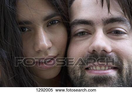 Stock Photography - Close-up of young couple, portrait. Fotosearch
