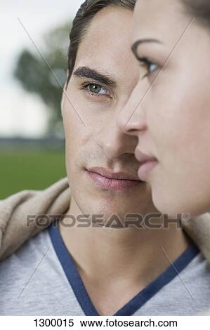 Close up of young couple View Large Photo Image Stock Photography - Close up of young couple. Fotosearch