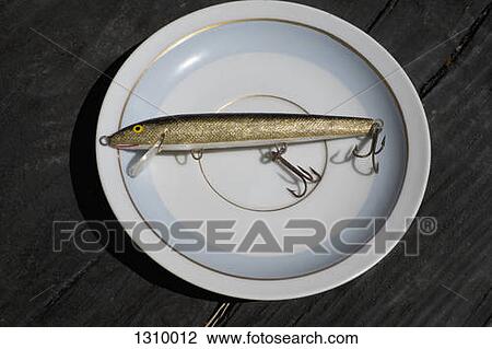 Fishing tackle on plate, close-up View Large Photo Image Stock Image - Fishing tackle on plate, close-up. Fotosearch
