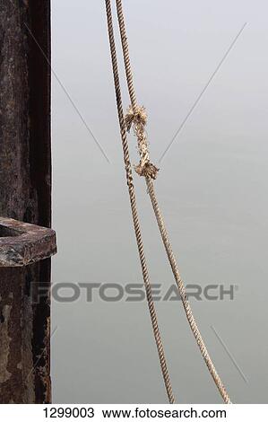 Stock Image - Frayed rope, close-up. Fotosearch