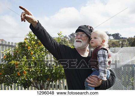 Grandfather with grandson View Large Photo Image Stock Photo - Grandfather with grandson. Fotosearch