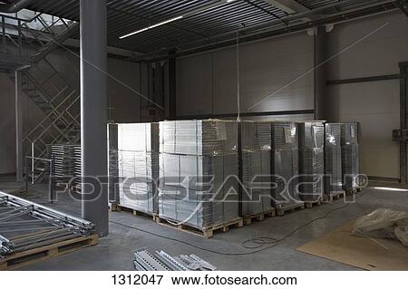 Interior view of modern warehouse View Large Photo Image Stock Photo - Interior view of modern warehouse. Fotosearch