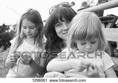 Mother with daughters View Large Photo Image Stock Image - Mother with daughters. Fotosearch