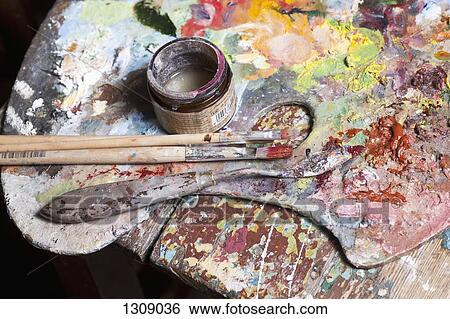 Stock Photograph - Paintbrush and palette, close-up. Fotosearch