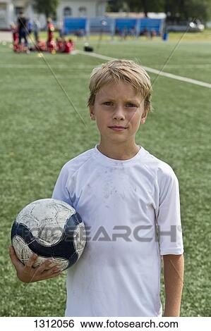 Stock Photograph - Portrait of boy, smiling. Fotosearch