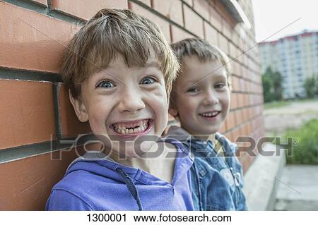 Stock Image - Portrait of boys smiling. Fotosearch