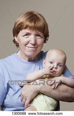 Portrait of grandmother with grandson, close-up View Large Photo Image Stock Photo - Portrait of grandmother with grandson, close-up. Fotosearch
