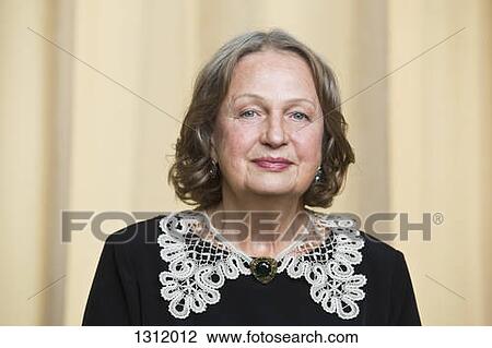 Portrait of senior woman smiling, close-up View Large Photo Image Stock Image - Portrait of senior woman smiling, close-up. Fotosearch
