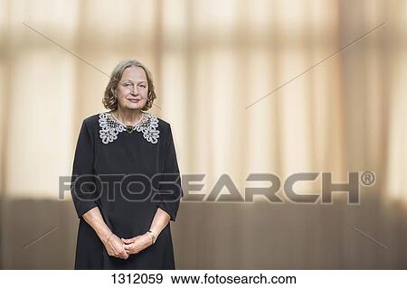 Portrait of senior woman, smiling View Large Photo Image Stock Photo - Portrait of senior woman, smiling. Fotosearch
