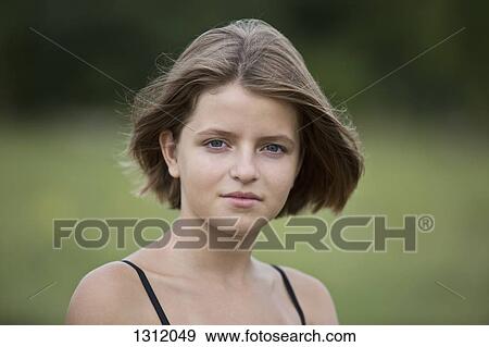 Portrait of teenage girl, close-up View Large Photo Image Stock Photo - Portrait of teenage girl, close-up. Fotosearch