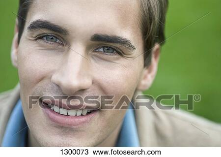 Stock Image - Portrait of young man, close-up. Fotosearch