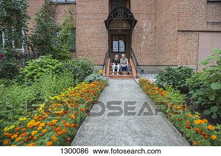 Senior couple sitting on steps View Large Photo Image Stock Photograph - Senior couple sitting on steps. Fotosearch