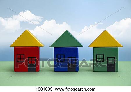 Three houses made from toy blocks View Large Photo Image Stock Image - Three houses made from toy blocks. Fotosearch