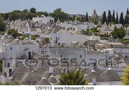 Trulli houses with conical roofs in Alberobello View Large Photo Image Stock Image - Trulli houses with conical roofs in Alberobello. Fotosearch