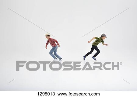 Stock Image - Two boys running opposite direction against white background. Fotosearch