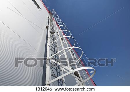 Warehouse with ladder, low angle view View Large Photo Image Stock Photography - Warehouse with ladder, low angle view. Fotosearch