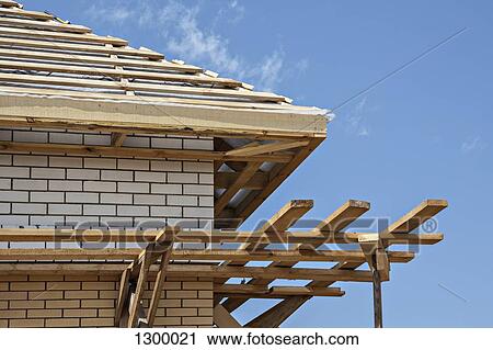Wooden roof under construction View Large Photo Image Stock Image - Wooden roof under construction. Fotosearch