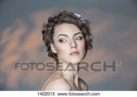 Beautiful young woman looking away View Large Photo Image Stock Photography - Beautiful young woman looking away. Fotosearch