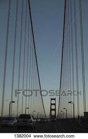 Cars on Golden Gate Bridge against clear sky during dusk View Large Photo Image Picture - Cars on Golden Gate Bridge against clear sky during dusk. Fotosearch