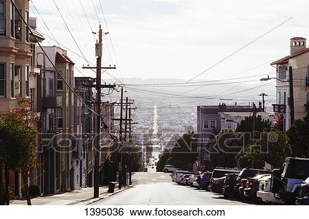 Stock Photograph - City street against sky. Fotosearch