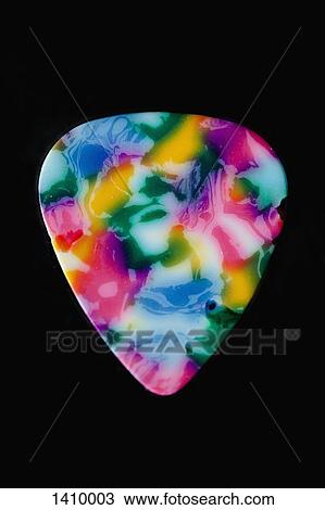Stock Image - Close-up of abstract shape against black background. Fotosearch