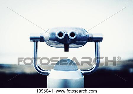 Close-up of coin-operated binoculars against clear sky View Large Photo Image Stock Image - Close-up of coin-operated binoculars against clear sky. Fotosearch