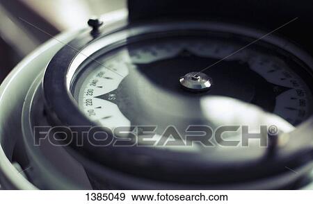 Stock Photo - Close-up of compass. Fotosearch