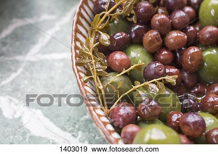 Close-up of olives View Large Photo Image Stock Photo - Close-up of olives. Fotosearch
