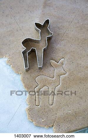 Close-up of pastry cutter on dough View Large Photo Image Stock Photo - Close-up of pastry cutter on dough. Fotosearch