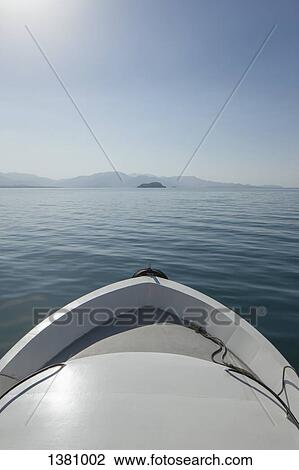 Cropped image of boat on sea against clear sky View Large Photo Image Stock Image - Cropped image of boat on sea against clear sky. Fotosearch