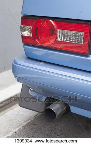 Picture - Cropped image of car parked on street. Fotosearch