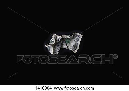 Crumpled dollar bill on black background View Large Photo Image Picture - Crumpled dollar bill on black background. Fotosearch