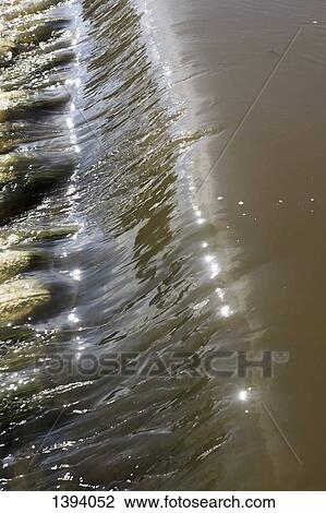 Stock Image - Detail of wave. Fotosearch