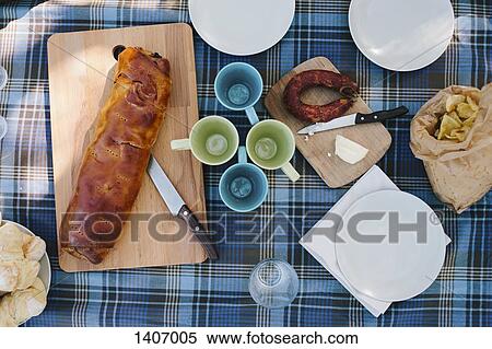 Directly above shot of empty mugs with bread on table outdoors View Large Photo Image Stock Photography - Directly above shot of empty mugs with bread on table outdoors. Fotosearch